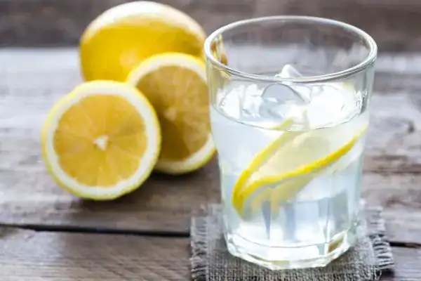 Hydration: The Secret Ingredient for a Toned Stomach and Enhanced Fitness 2 Image of lemon water to aid hydration Ayr